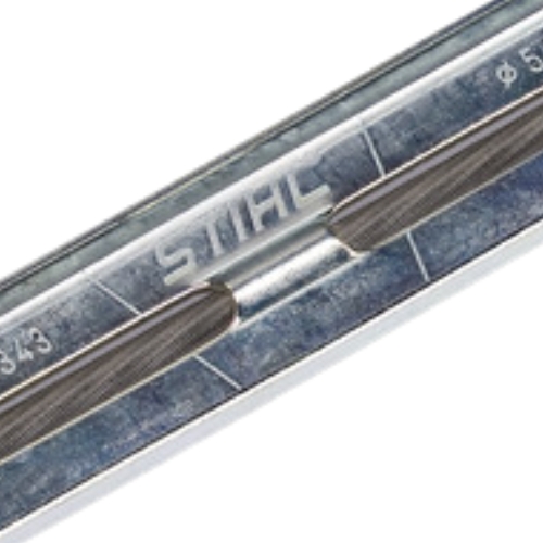 wyrysowane linie do prowadzenia pilnika na prowadniku stihl